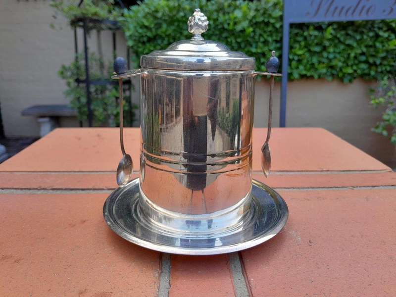 A Rare Pair of Silver Plate Tea Caddies (Regular and Decaf Tea)  each with Two Teaspoons with Re...