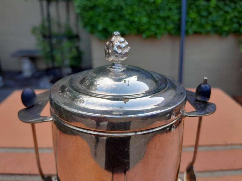A Rare Pair of Silver Plate Tea Caddies (Regular and Decaf Tea)  each with Two Teaspoons with Re...