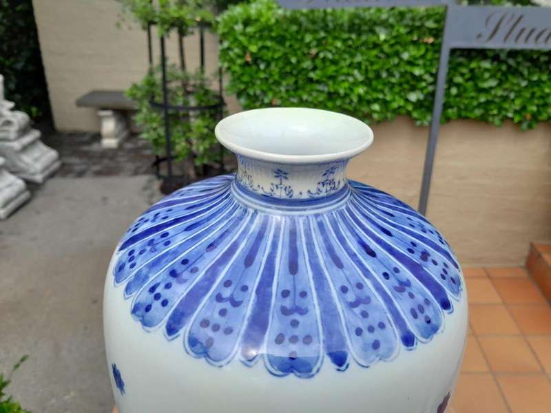 A 20TH Century Hand-Painted Oriental Ceramic Blue and White Urn / Vase