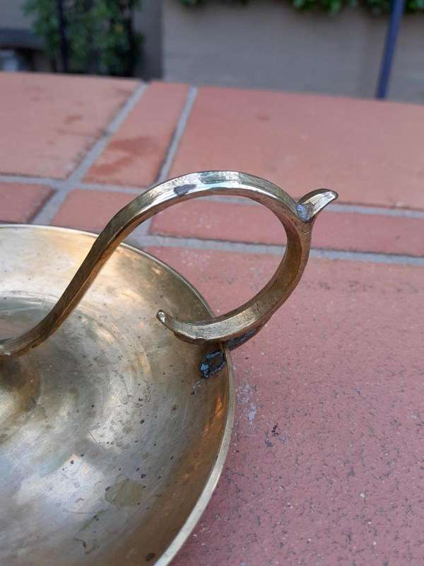 An Antique Hand Portable Brass Candle Holder With Great Vintage Patina