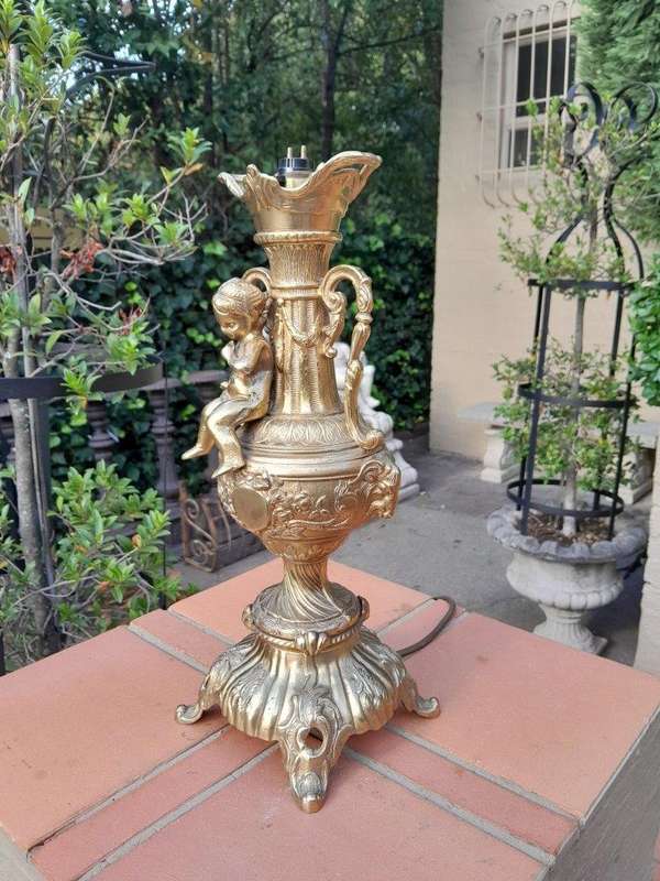 A 20th Century Heavy and Ornate Gold Lamp