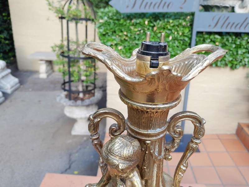 A 20th Century Heavy and Ornate Gold Lamp