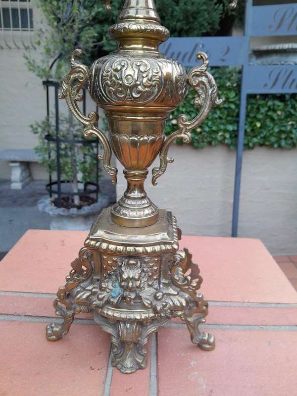 A 20TH Century Pair of Ornate French Style  Brass Candelabras