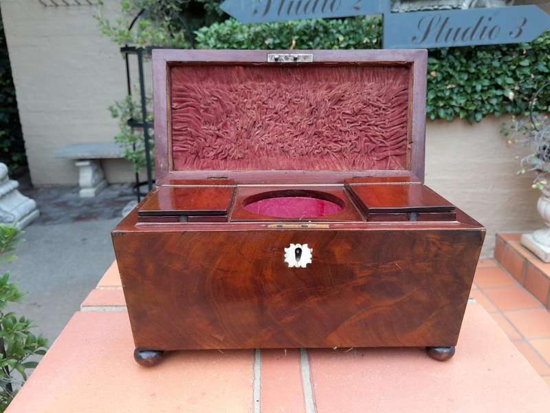 An Antique Regency Walnut Tea Caddy