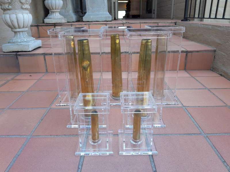 A Mid-20th Century Circa 1945 Set of Seven WW2 Brass Cannon Shells In Perspex Boxes