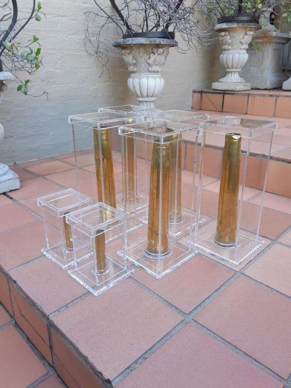 A Mid-20th Century Circa 1945 Set of Seven WW2 Brass Cannon Shells In Perspex Boxes