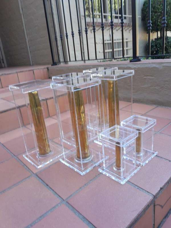 A Mid-20th Century Circa 1945 Set of Seven WW2 Brass Cannon Shells In Perspex Boxes