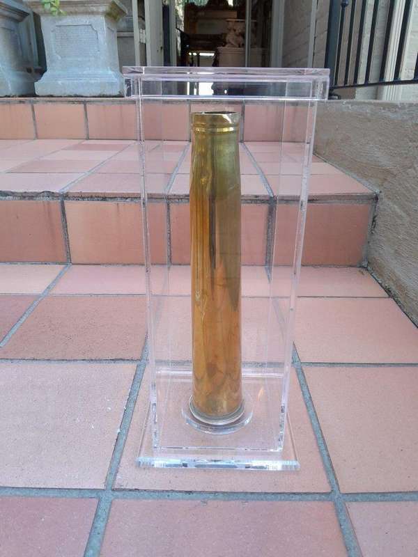 A Mid-20th Century Circa 1945 Set of Seven WW2 Brass Cannon Shells In Perspex Boxes