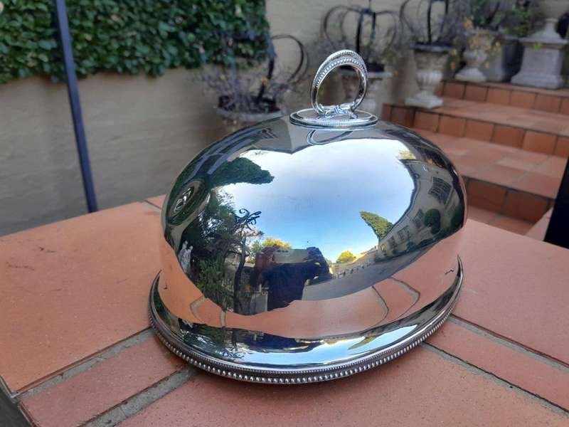 An Electroplate Food Dome Dimensions: 31cm wide R3800