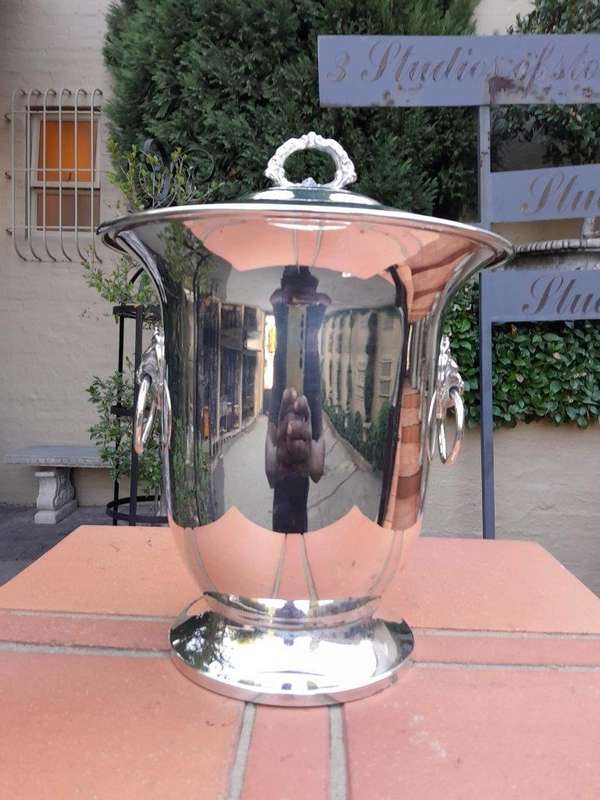 A 20th Century Electroplate Ice Bucket Dimensions 30cm high R3500