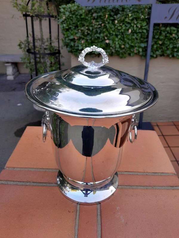 A 20th Century Electroplate Ice Bucket Dimensions 30cm high R3500