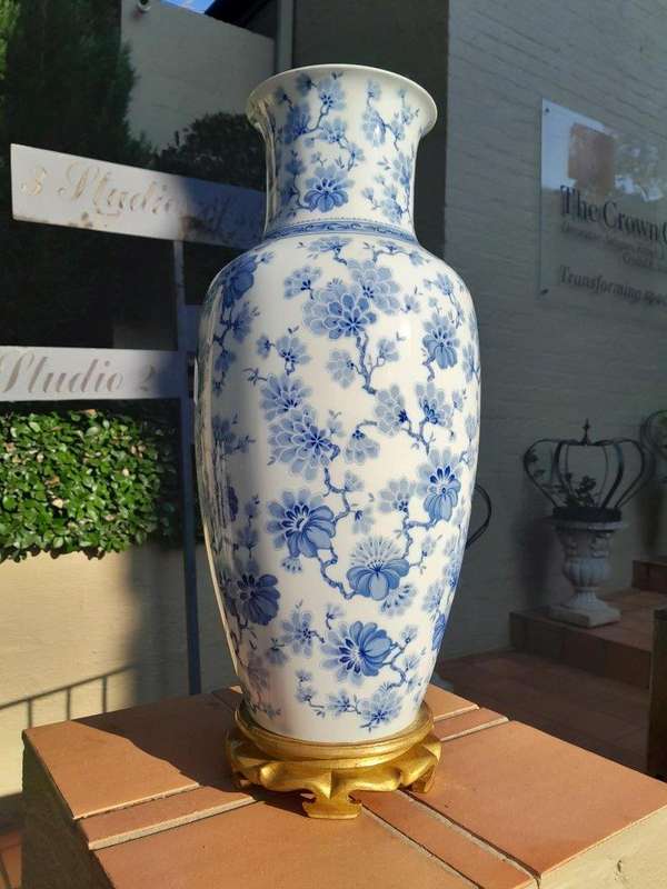 A 20th Century Large Vase On Hand Gilded Wooden Stand