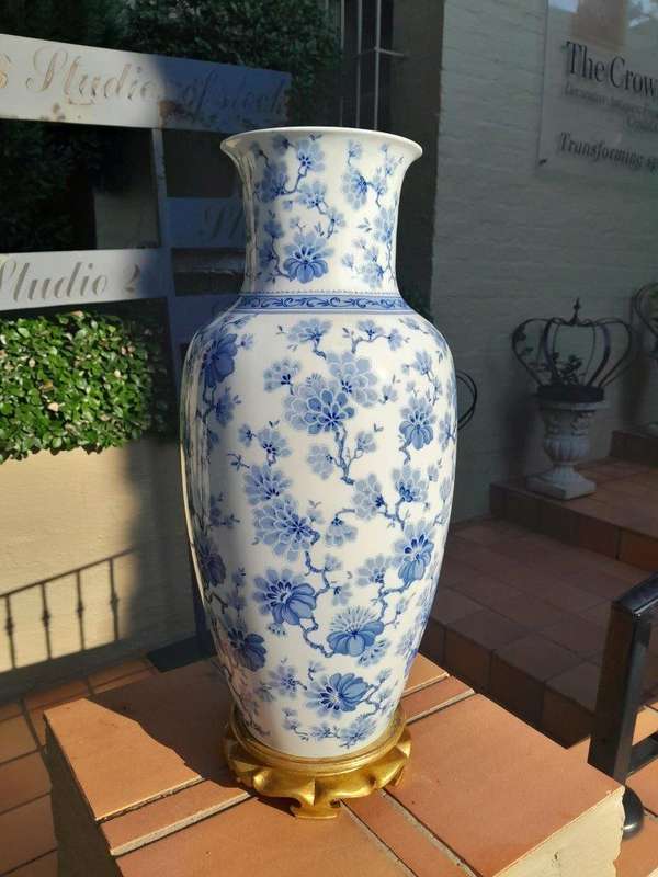 A 20th Century Large Vase On Hand Gilded Wooden Stand