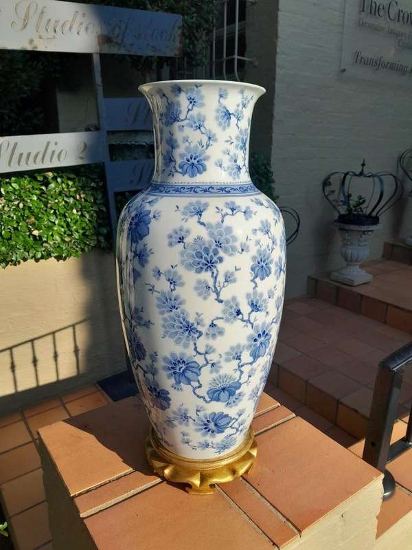 A 20th Century Large Vase On Hand Gilded Wooden Stand