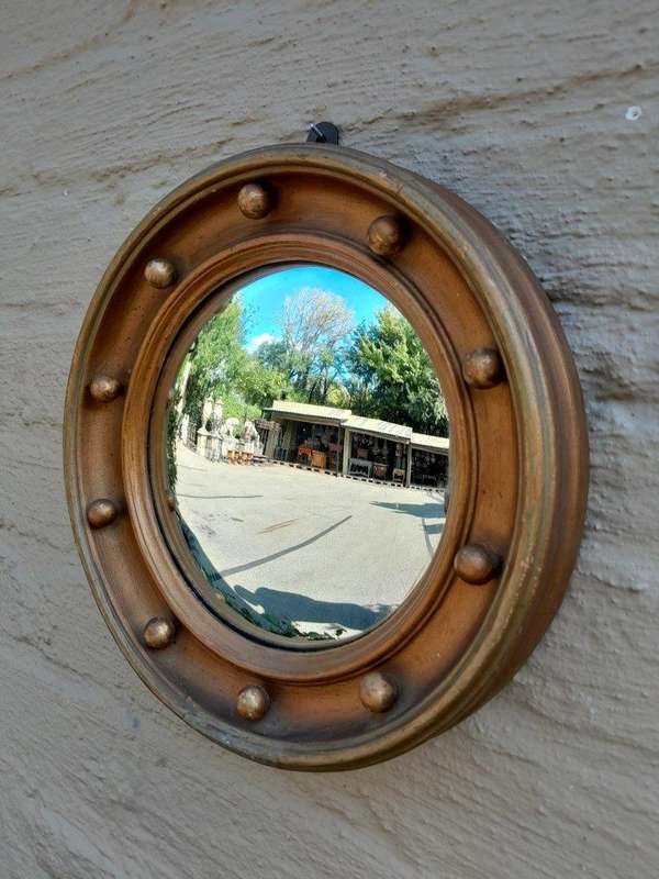 An early 20th Century Circa 1920 Regency Style Giltwood Mirror with Convex Frame