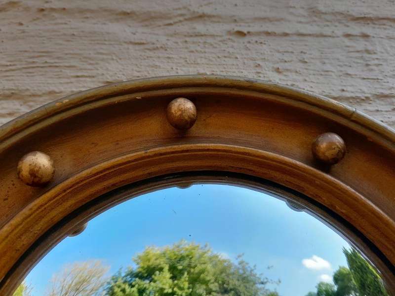 An early 20th Century Circa 1920 Regency Style Giltwood Mirror with Convex Frame