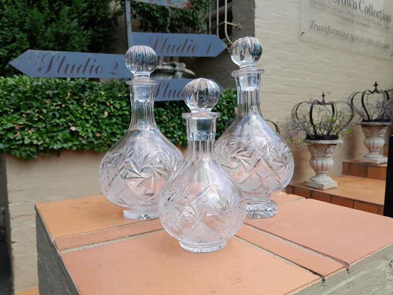 A Set of  Three Neman Cut Crystal Decanters