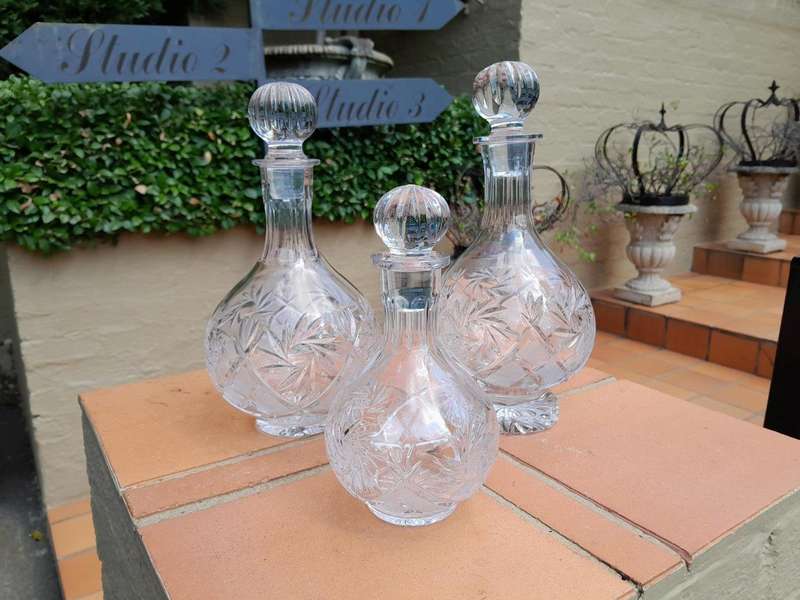 A Set of  Three Neman Cut Crystal Decanters