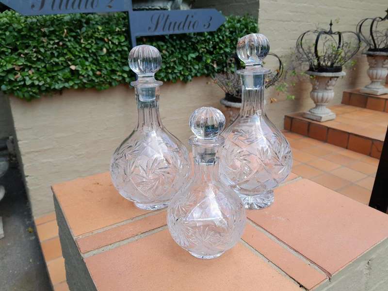 A Set of  Three Neman Cut Crystal Decanters