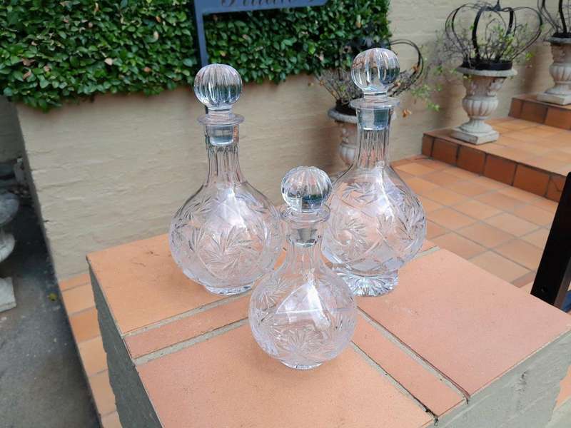 A Set of  Three Neman Cut Crystal Decanters