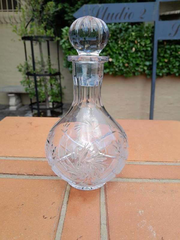 A Set of  Three Neman Cut Crystal Decanters