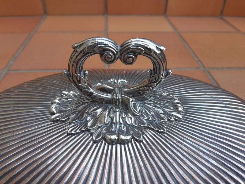 An Antique Near Pair of Two Sheffield EPNS Food Domes 