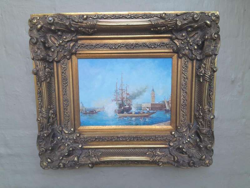 A 20th Century Continental School Oil on Canvas Ship Painting in a Ornately Carved and Gilded Frame
