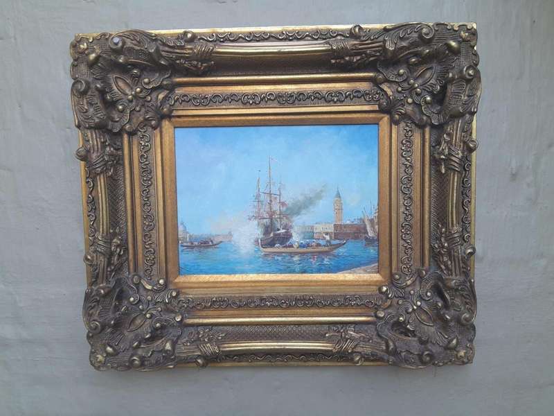 A 20th Century Continental School Oil on Canvas Ship Painting in a Ornately Carved and Gilded Frame
