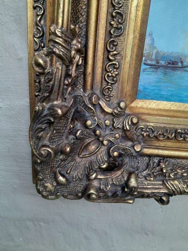 A 20th Century Continental School Oil on Canvas Ship Painting in a Ornately Carved and Gilded Frame