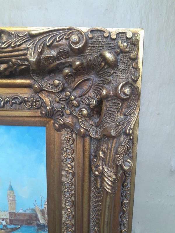 A 20th Century Continental School Oil on Canvas Ship Painting in a Ornately Carved and Gilded Frame
