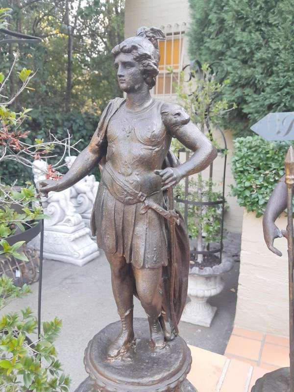A Pair of 19th Century Patinated Spelter Roman Figures