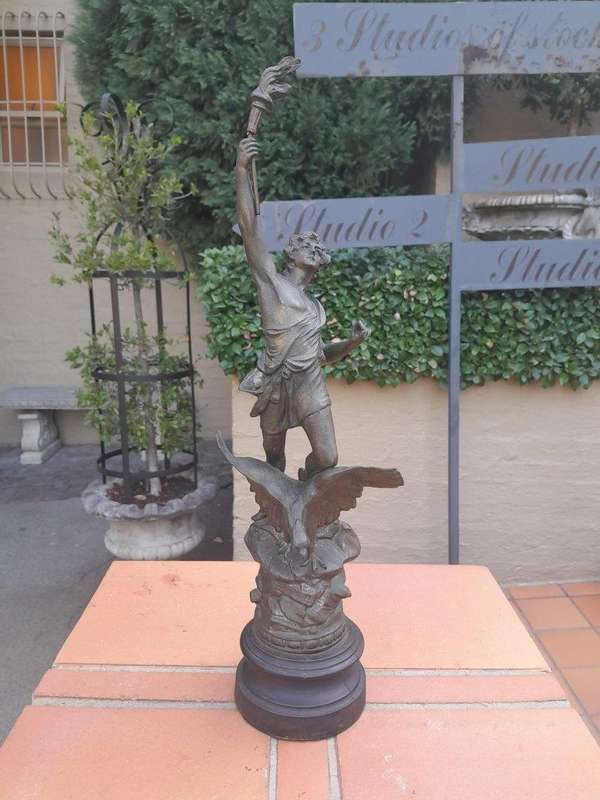 An Early 20th Century French Patinated Spelter Figurine on Wooden Base