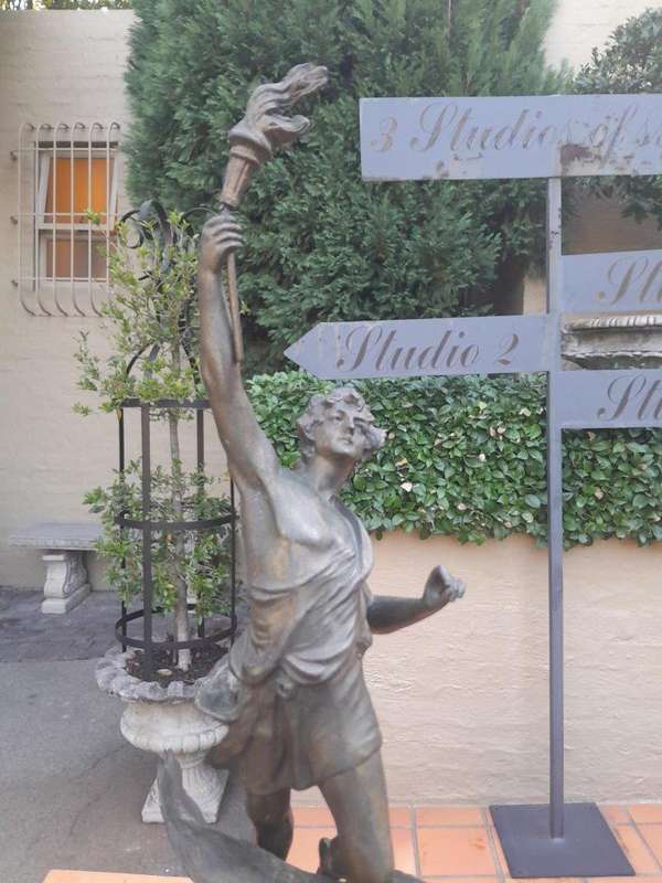 An Early 20th Century French Patinated Spelter Figurine on Wooden Base