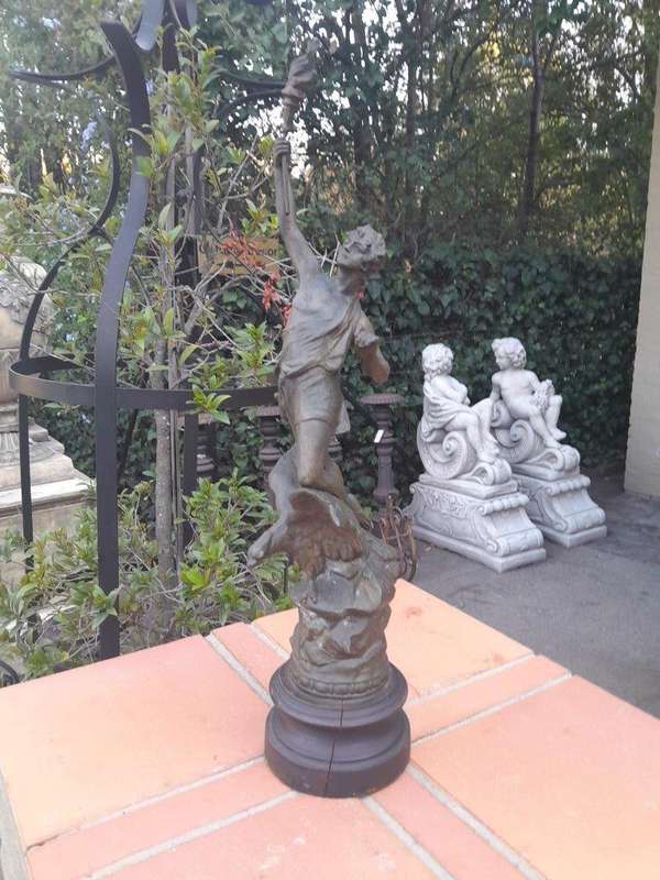 An Early 20th Century French Patinated Spelter Figurine on Wooden Base