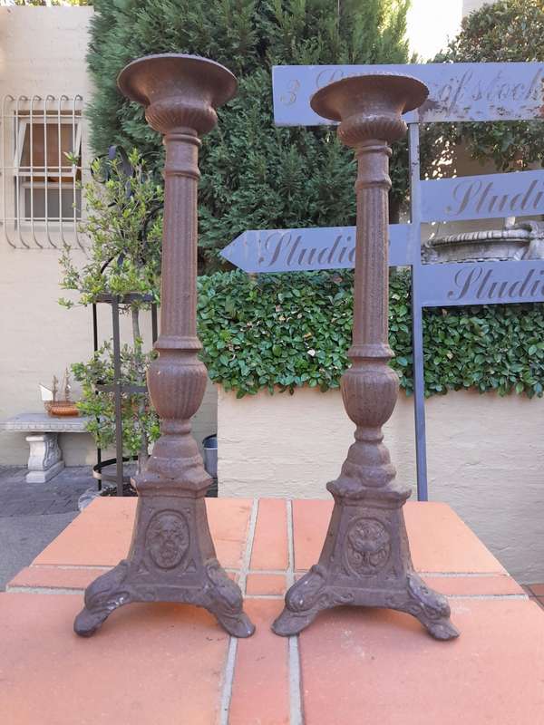 A Pair Of  French Cast Iron Candle Holders