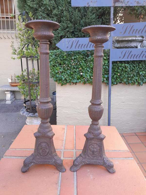 A Pair Of  French Cast Iron Candle Holders