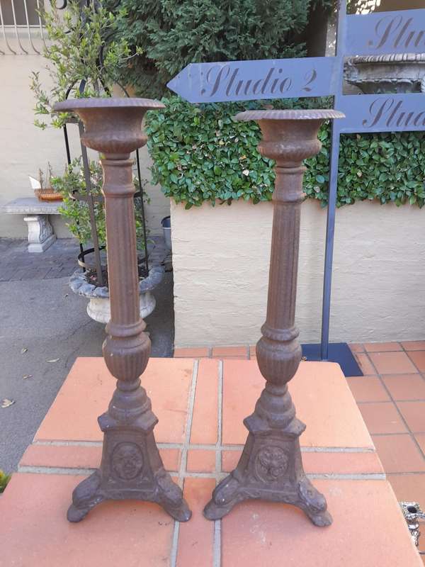 A Pair Of  French Cast Iron Candle Holders