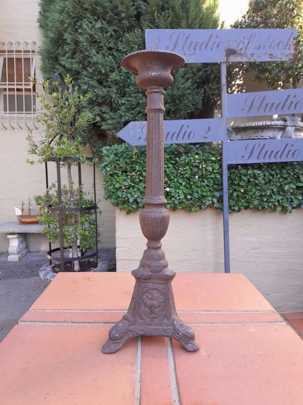 A Pair Of  French Cast Iron Candle Holders