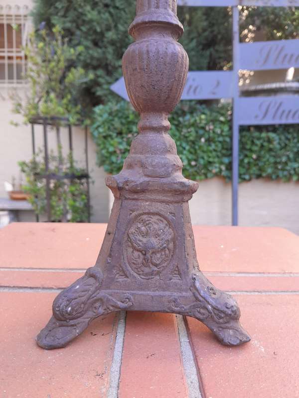 A Pair Of  French Cast Iron Candle Holders