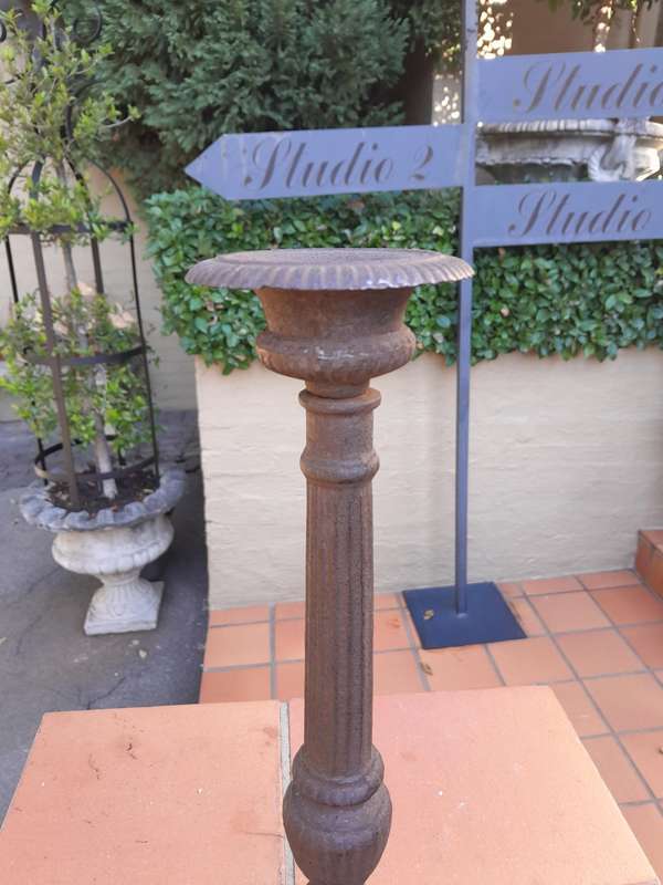 A Pair Of  French Cast Iron Candle Holders