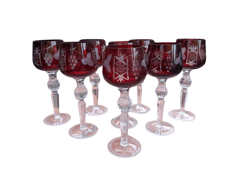 A 20th Century Set Of Eight Burgundy Bohemian Cut Crystal Wine Glasses