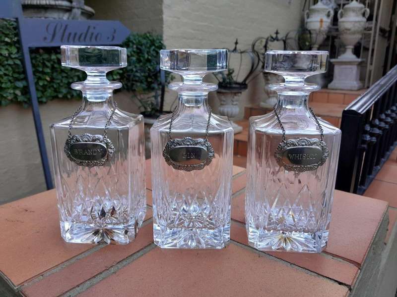 A Set Of Three Cut Glass Decanters With Labels (Whisky, Gin And  Brandy)