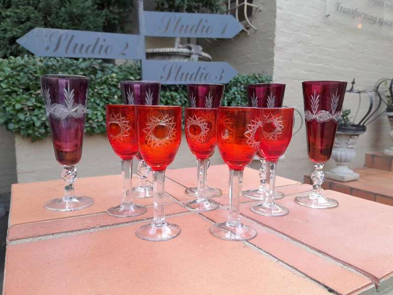 A 20th Century Collection Of Eleven Bohemian Cut Crystal Champagne And Sherry Glasses