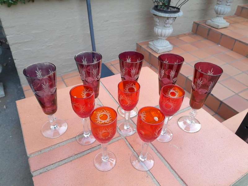 A 20th Century Collection Of Eleven Bohemian Cut Crystal Champagne And Sherry Glasses