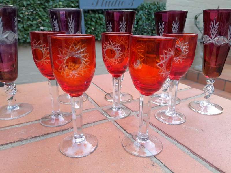 A 20th Century Collection Of Eleven Bohemian Cut Crystal Champagne And Sherry Glasses