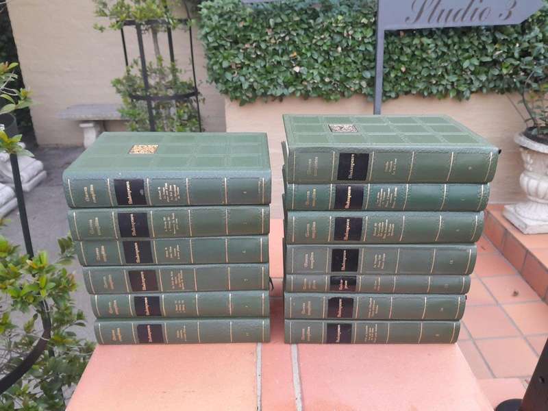 A 20th Century French Set Of Thirteen Volumes Of Shakespeare Covered In Green Leather With Gilded...