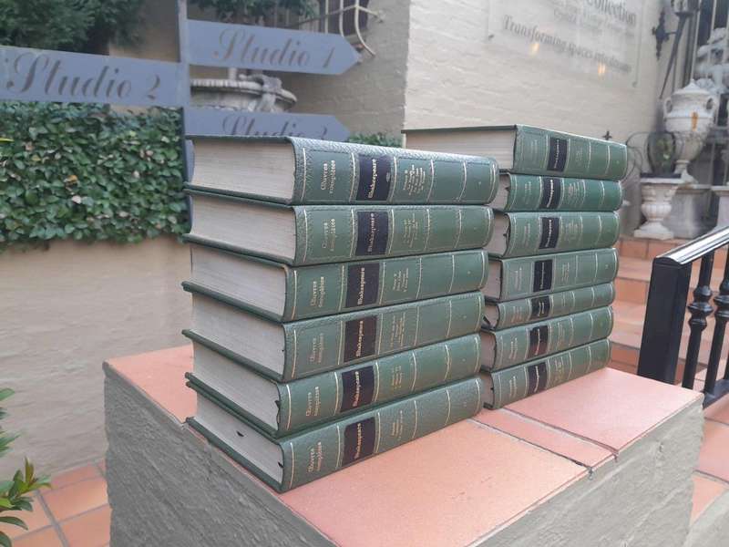 A 20th Century French Set Of Thirteen Volumes Of Shakespeare Covered In Green Leather With Gilded...