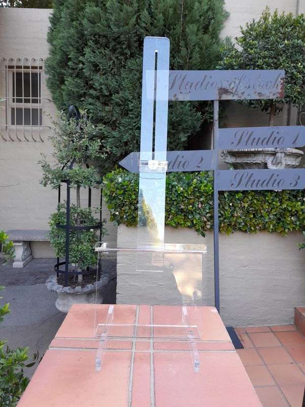 A Perspex Table Easels ND