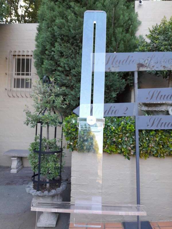 A Perspex Table Easels ND