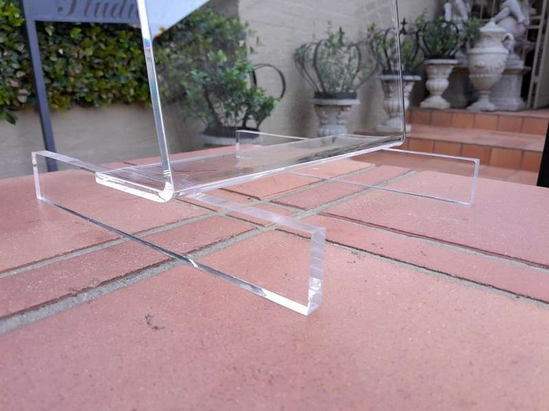 A Perspex Table Easels ND